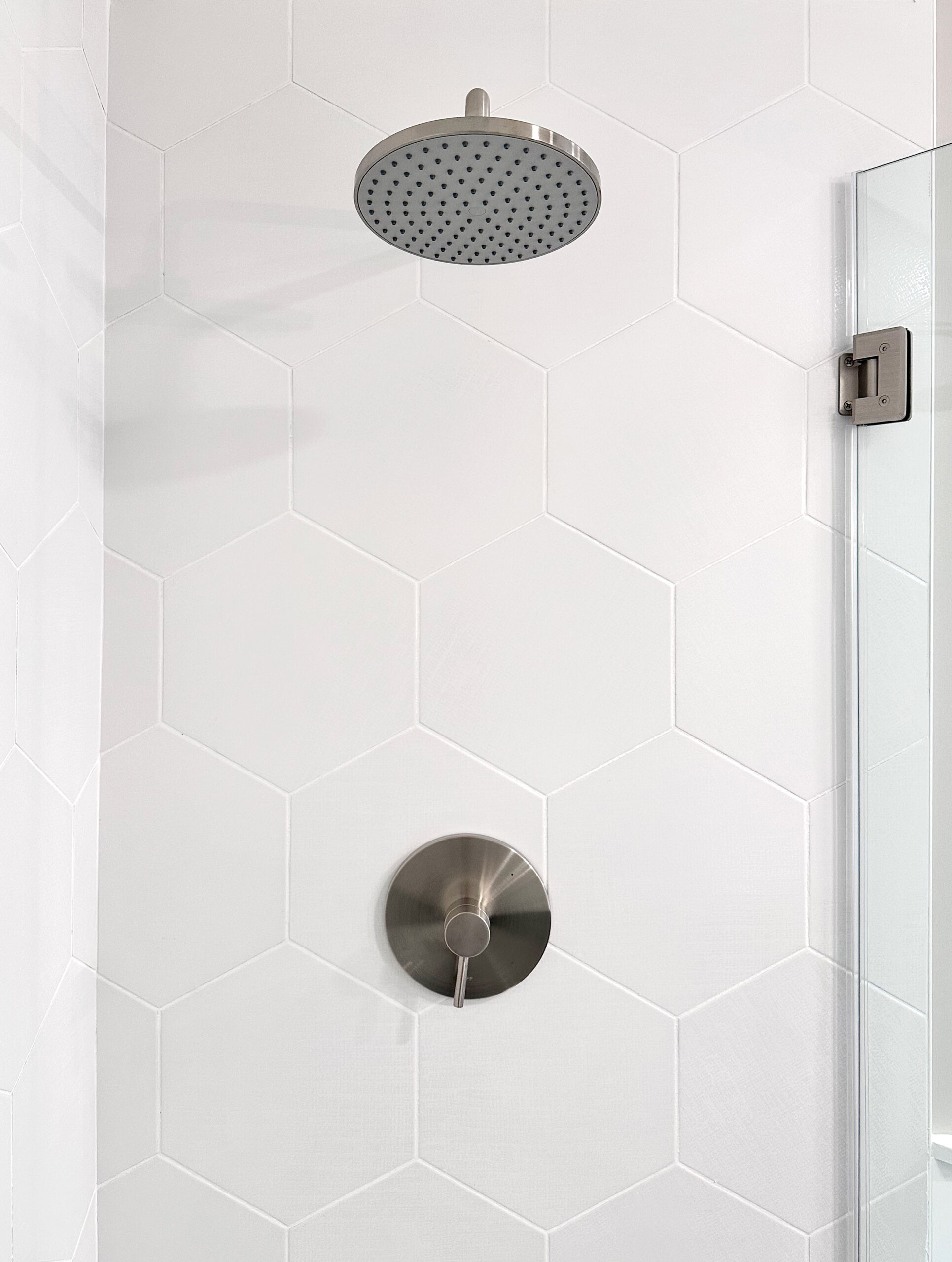 interior of shower with white tile