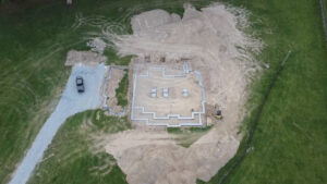aerial view of the foundation of a home being mapped out